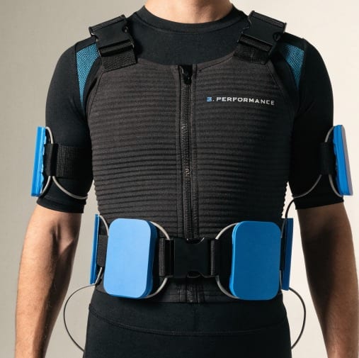 The 9. PERFORMANCE EMS suit, worn front-on, showing the module placement over the chest, waist, and arms